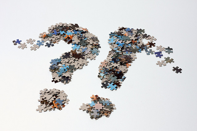 A question and exclamation mark of jigsaw puzzle pieces by Horia Varlan